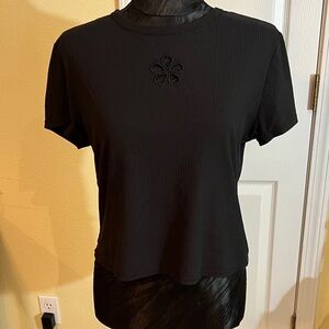 No Boundaries Black Ribbed Crop Top with Floral Accent